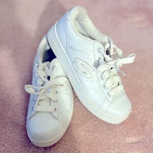 White Skechers sneakers size 7 1/2 women’s, worn 1 time.